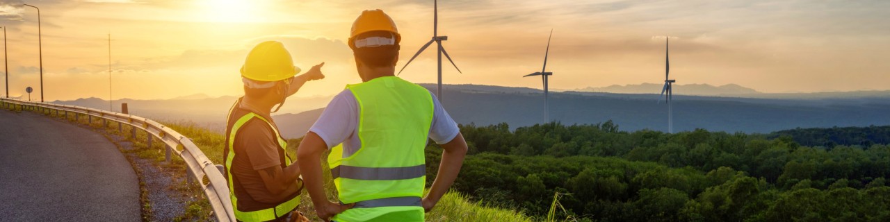 Wind turbines in front of sunset